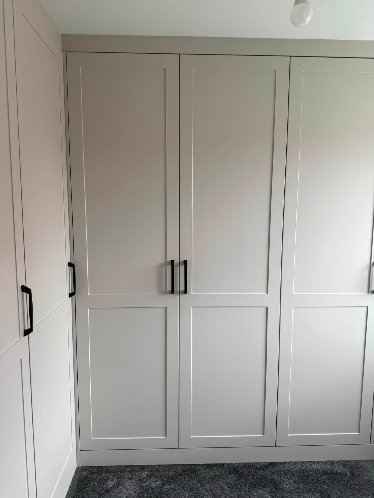 Fitted corner wardrobes with shaker doors built for a Blyth home by Interiors By Build NE